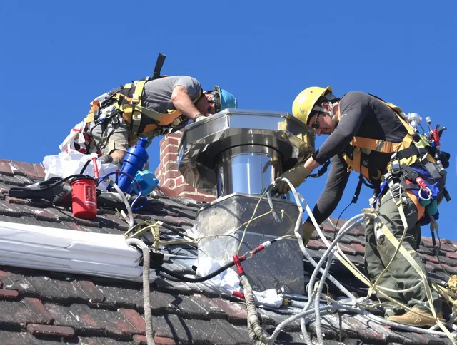 Protective chimney cap installed by New Britain Chimney Sweep in New Britain, CT