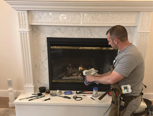New Britain Chimney Sweep performing fireplace maintenance in New Britain, CT